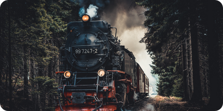 Historic steam locomotive with engineer demonstrating early dead man's switch safety system for end of life planning
